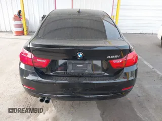 2015 BMW 4 Series 428i with VIN WBA4A9C52FGL85228, listed as a IAAI auction lot 41228043 with 152,729 mi miles and . Bid and sale history available at DreamBid. Image 16.