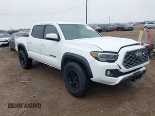 2021 Toyota Tacoma 4WD SR with VIN 5TFCZ5AN6MX258059, listed as a IAAI auction lot 41412420 with 52,354 mi miles. Bid and sale history available at carsss.com. Image 1.