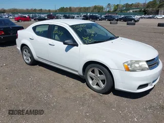 2013 Dodge Avenger SE with VIN 1C3CDZABXDN551796, listed as a IAAI auction lot 42142302 with 999,999 mi miles. Bid and sale history available at carsss.com. Image 1.