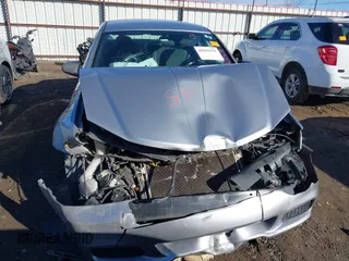 2014 Dodge Avenger SE with VIN 1C3CDZAB7EN144102, listed as a IAAI auction lot 41635691 with 201,428 mi miles and . Bid and sale history available at DreamBid. Image 12.