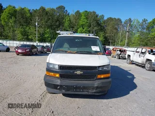 2021 Chevrolet Express Cargo with VIN 1GCWGAFP0M1262410, listed as a IAAI auction lot 42007712 with 61,620 mi miles and . Bid and sale history available at DreamBid. Image 12.