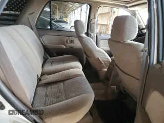 2000 Toyota 4Runner SR5 z VIN JT3GN86R9Y0169700, wystawiony jako Copart lot #56574135 z przebiegiem 197 734 mil mil oraz Szkoda całkowita • Salvage title. Historia ofert i sprzedaży dostępna na DreamBid. Obrazek 10.