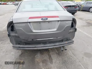 2011 Ford Fusion SE with VIN 3FAHP0HA1BR203046, listed as a IAAI auction lot 42011121 with 302,078 mi miles. Bid and sale history available at carsss.com. Image 6.
