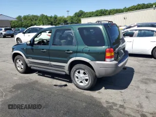 2002 Ford Escape XLT Choice with VIN 1FMCU04172KD00268, listed as a Copart auction lot 61284675 with 118,016 mi miles and Salvage title. Bid and sale history available at DreamBid. Image 2.