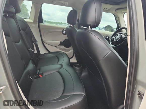 2015 MINI Hardtop 4 Door with VIN WMWXS5C5XFT831555, listed as a Copart auction lot 61673485 with 104,120 mi miles and Salvage title. Bid and sale history available at DreamBid. Image 10.