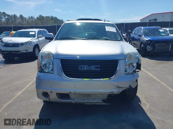 2014 GMC Yukon SLT with VIN 1GKS1CE04ER121301, listed as a IAAI auction lot 41825056 with 141,562 mi miles. Bid and sale history available at carsss.com. Image 13.