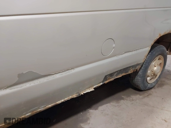 2007 Ford Econoline Passenger XL with VIN 1FBNE31L67DA26594, listed as a IAAI auction lot 41753476 with 154,709 mi miles. Bid and sale history available at carsss.com. Image 6.