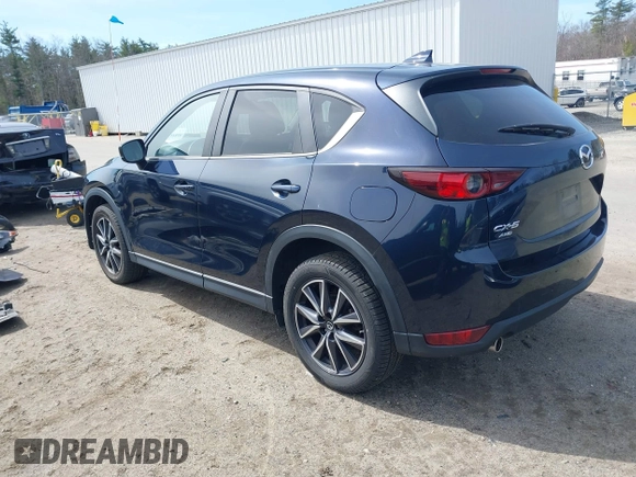 2018 Mazda CX-5 Touring z VIN JM3KFBCM4J0379871, wystawiony jako IAAI lot #41865130 z przebiegiem 48 674 mil mil oraz . Historia ofert i sprzedaży dostępna na DreamBid. Obrazek 3.