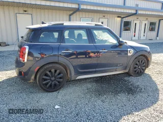 2018 MINI Countryman Cooper S E with VIN WMZYU7C47J3E56451, listed as a Copart auction lot 77193144 with 60,949 mi miles and Salvage Title. Bid and sale history available at carsss.com. Image 3.