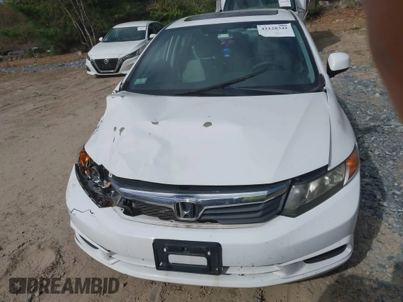 2012 Honda Civic EX with VIN 2HGFB2F81CH607670, listed as a IAAI auction lot 42128341 with 104,090 mi miles and . Bid and sale history available at DreamBid. Image 12.