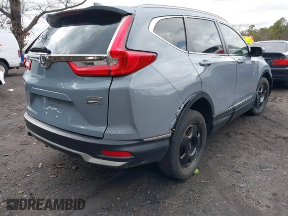 2021 Honda CR-V Touring with VIN 2HKRW2H90MH680172, listed as a IAAI auction lot 41708749 with 26,619 mi miles. Bid and sale history available at carsss.com. Image 4.