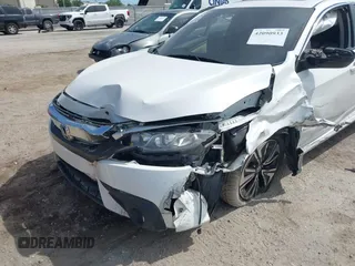 2018 Honda Civic EX-T z VIN 19XFC1F3XJE004123, wystawiony jako IAAI lot #42090933 z przebiegiem 81 228 mil mil oraz . Historia ofert i sprzedaży dostępna na DreamBid. Obrazek 6.