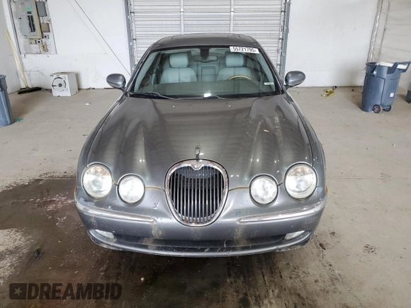 2003 Jaguar S-Type z VIN SAJEA01U93HM88490, wystawiony jako Copart lot #55721795 z przebiegiem 192 773 mil mil oraz Tytuł czysty. Historia ofert i sprzedaży dostępna na DreamBid. Obrazek 5.