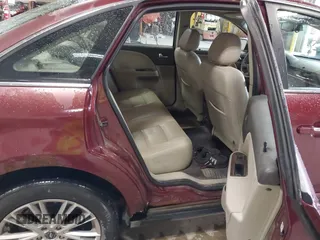 2008 Ford Taurus Limited with VIN 1FAHP28W28G153930, listed as a IAAI auction lot 42154827 with 243,386 mi miles. Bid and sale history available at carsss.com. Image 8.