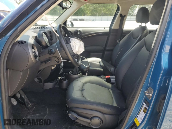 2012 MINI Countryman with VIN WMWZB3C55CWM30373, listed as a Copart auction lot 56836925 with 44,146 mi miles and Salvage title. Bid and sale history available at DreamBid. Image 7.