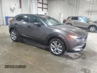 2021 Mazda CX-30 Premium with VIN 3MVDMBDL8MM261593, listed as a Copart auction lot 47950895 with 25,029 mi miles and Salvage Title. Bid and sale history available at carsss.com. Image 4.