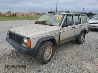 1995 Jeep Cherokee Sport with VIN 1J4FJ68S4SL618773, listed as a Copart auction lot 74126954 with 318,519 mi miles and Salvage Title. Bid and sale history available at carsss.com. Image 1.