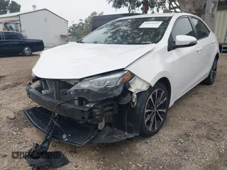 2019 Toyota Corolla L with VIN 5YFBURHE3KP895705, listed as a IAAI auction lot 42034995 with 173,719 mi miles and . Bid and sale history available at DreamBid. Image 6.