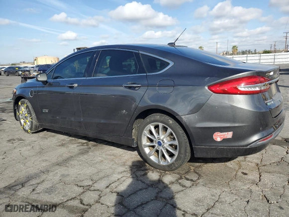 2018 Ford Fusion Energi SE with VIN 3FA6P0PU2JR218527, listed as a Copart auction lot 47657745 with 67,317 mi miles and Salvage Title. Bid and sale history available at carsss.com. Image 2.
