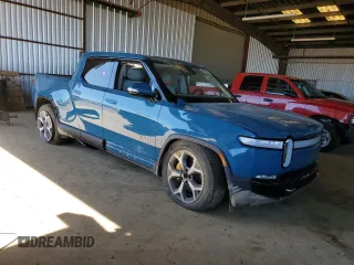 2022 Rivian R1T Adventure Package with VIN 7FCTGAAA8NN014044, listed as a Copart auction lot 49919865 with 0 mi miles and Salvage Title. Bid and sale history available at carsss.com. Image 4.