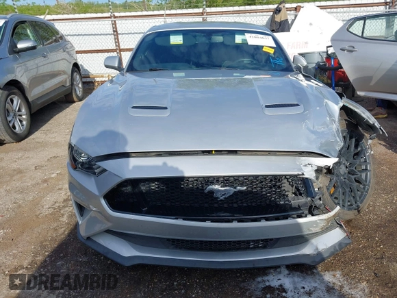2018 Ford Mustang GT z VIN 1FA6P8CF4J5182655, wystawiony jako IAAI lot #42084037 z przebiegiem 57 987 mil mil oraz . Historia ofert i sprzedaży dostępna na DreamBid. Obrazek 13.
