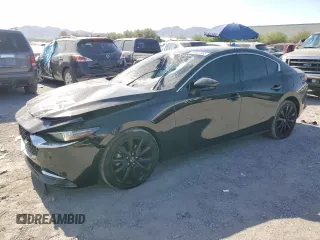 2021 Mazda 3 Premium Plus with VIN JM1BPBEY2M1312397, listed as a Copart auction lot 58807355 with 67,844 mi miles and Salvage title. Bid and sale history available at DreamBid. Image 1.