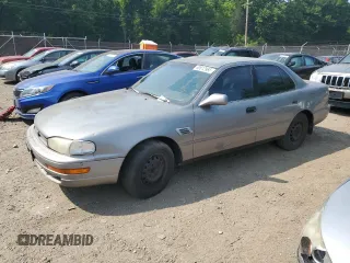 1993 Toyota Camry LE with VIN 4T1SK12E4PU206552, listed as a Copart auction lot 60812965 with 184,101 mi miles and Salvage title. Bid and sale history available at DreamBid. Image 1.