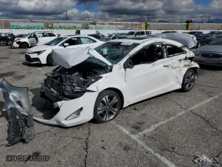 2013 Hyundai Elantra Coupe GS with VIN KMHDH6AE6DU001221, listed as a Copart auction lot 41312444 with 84,938 mi miles and Salvage Title. Bid and sale history available at carsss.com. Image 1.