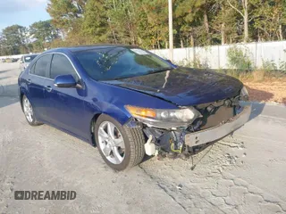2012 Acura TSX with VIN JH4CU2F40CC029118, listed as a IAAI auction lot 40771412 with 100,471 mi miles. Bid and sale history available at carsss.com. Image 1.