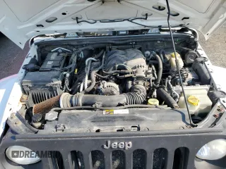 2013 Jeep Wrangler Unlimited Sport z VIN 1C4HJWDG9DL581643, wystawiony jako Copart lot #60775805 z przebiegiem 148 959 mil mil oraz Czysty tytuł • Clean title. Historia ofert i sprzedaży dostępna na DreamBid. Obrazek 12.