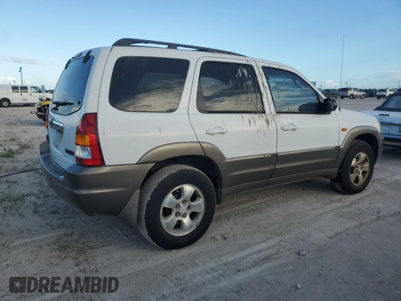 2002 Mazda Tribute LX with VIN 4F2YU09182KM09244, listed as a Copart auction lot 76758954 with Not Provided miles and Non Repairable. Bid and sale history available at carsss.com. Image 3.