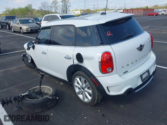 2016 MINI Countryman S with VIN WMWZC3C51GWT10458, listed as a IAAI auction lot 41878799 with 112,019 mi miles and . Bid and sale history available at DreamBid. Image 3.