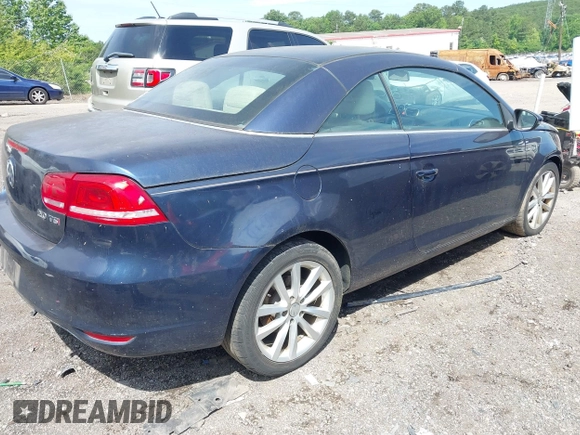 2012 Volkswagen Eos Komfort with VIN WVWBW7AH5CV005559, listed as a IAAI auction lot 42206644 with 160,843 mi miles and . Bid and sale history available at DreamBid. Image 4.
