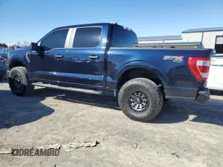 2023 Ford F-150 XL with VIN 1FTFW1E55PKD59670, listed as a Copart auction lot 48297005 with 20,668 mi miles and Salvage Title. Bid and sale history available at carsss.com. Image 2.