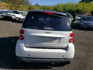 2012 Smart fortwo Pure z VIN WMEEJ3BA1CK577558, wystawiony jako Copart lot #39598584 z przebiegiem Nie podano mil oraz Szkody całkowita. Historia ofert i sprzedaży dostępna na DreamBid. Obrazek 6.