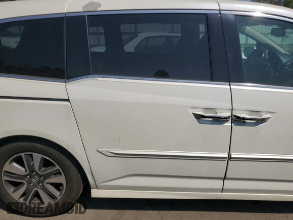 2014 Honda Odyssey Touring with VIN 5FNRL5H93EB041813, listed as a Copart auction lot 63920265 with 153,405 mi miles and Clean title. Bid and sale history available at DreamBid. Image 11.
