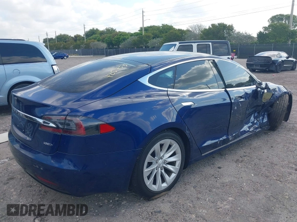 2017 Tesla Model S 100D with VIN 5YJSA1E28HF217489, listed as a IAAI auction lot 42128388 with Not provided miles and . Bid and sale history available at DreamBid. Image 4.
