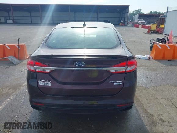 2017 Ford Fusion Titanium z VIN 3FA6P0K94HR271307, wystawiony jako IAAI lot #42595411 z przebiegiem 100 344 mil mil oraz . Historia ofert i sprzedaży dostępna na DreamBid. Obrazek 17.