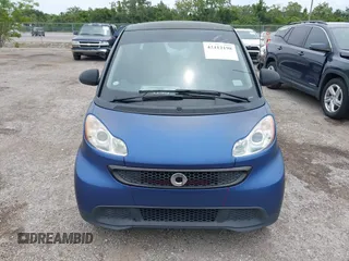 2013 Smart fortwo Pure with VIN WMEEJ3BA6DK664115, listed as a IAAI auction lot 42412198 with 64,522 mi miles and . Bid and sale history available at DreamBid. Image 12.