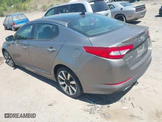 2012 Kia Optima SX with VIN 5XXGR4A64CG031334, listed as a IAAI auction lot 42045187 with 251,069 mi miles. Bid and sale history available at carsss.com. Image 3.