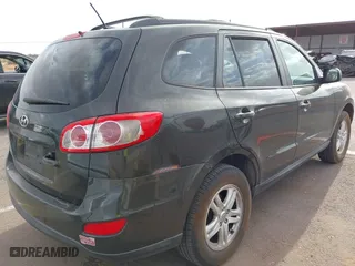 2012 Hyundai Santa Fe GLS with VIN 5XYZG3AB2CG128873, listed as a IAAI auction lot 41874808 with 182,453 mi miles. Bid and sale history available at carsss.com. Image 4.