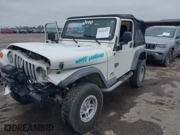 2005 Jeep Wrangler Sport with VIN 1J4FA49S25P320240, listed as a IAAI auction lot 41433371 with 144,552 mi miles. Bid and sale history available at carsss.com. Image 19.