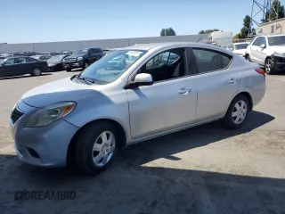 2012 Nissan Versa S with VIN 3N1CN7AP0CL921812, listed as a Copart auction lot 61962455 with 127,550 mi miles and Salvage title. Bid and sale history available at DreamBid. Image 1.