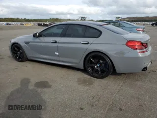 2015 BMW M6 z VIN WBS6C9C58FD467819, wystawiony jako Copart lot #70903944 z przebiegiem 85 596 mil mil oraz Szkoda całkowita • Salvage title. Historia ofert i sprzedaży dostępna na DreamBid. Obrazek 2.