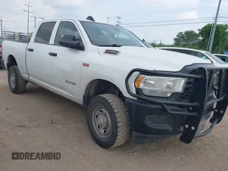2022 Ram 2500 Tradesman with VIN 3C6UR5CJXNG204016, listed as a IAAI auction lot 42146186 with 105,216 mi miles. Bid and sale history available at carsss.com. Image 1.