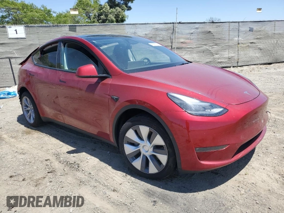 2024 Tesla Model Y Long Range with VIN 7SAYGDEE8RA233147, listed as a Copart auction lot 56695545 with 9,512 mi miles and Salvage title. Bid and sale history available at DreamBid. Image 4.