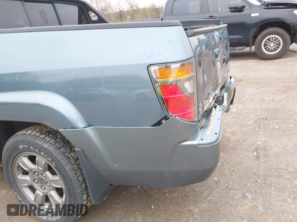 2007 Honda Ridgeline RTX with VIN 2HJYK16377H503711, listed as a IAAI auction lot 41886411 with 132,339 mi miles. Bid and sale history available at carsss.com. Image 12.