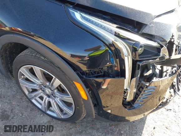 2019 Cadillac XT4 AWD Premium Luxury with VIN 1GYFZDR41KF213000, listed as a IAAI auction lot 41834826 with 66,662 mi miles and . Bid and sale history available at DreamBid. Image 17.