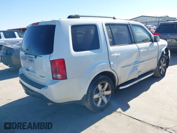 2012 Honda Pilot Touring with VIN 5FNYF3H91CB020673, listed as a IAAI auction lot 41721836 with 123,607 mi miles and . Bid and sale history available at carsss.com. Image 4.