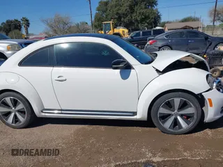 2012 Volkswagen Beetle with VIN 3VWV87AT1CM627756, listed as a IAAI auction lot 41657307 with 81,924 mi miles and . Bid and sale history available at DreamBid. Image 13.